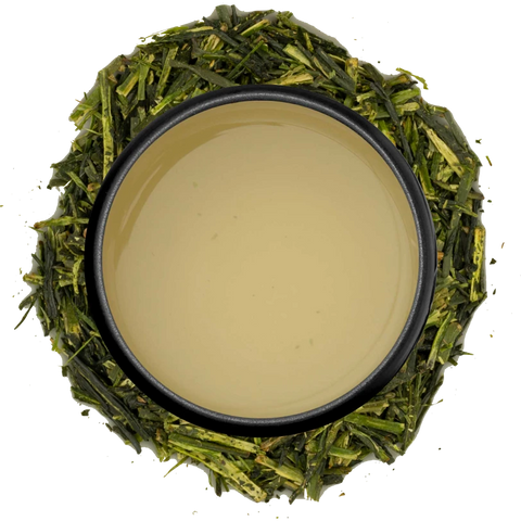 A cup of pale green karigane seen from above, ringed by gyokuro stems on a white background